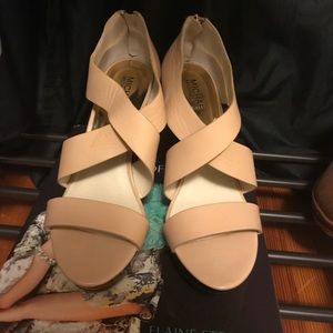 Michael  Kors wedges, never worn. Great buy!